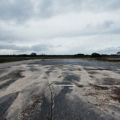 Abandoned Cracked Asphalt Road