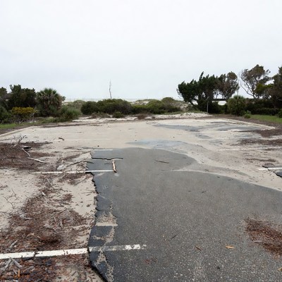 Abandoned Cracked Asphalt Beach Parking Lot