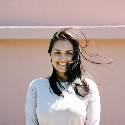 Smiling woman with flowing hair