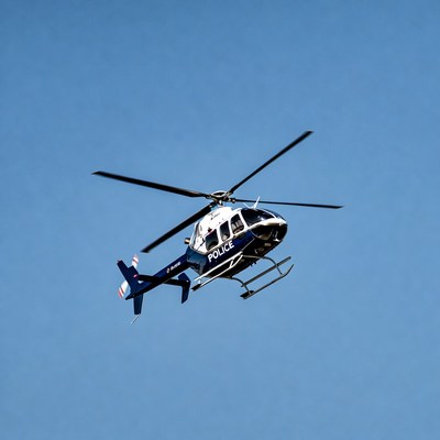 Police Helicopter Flying in Sky