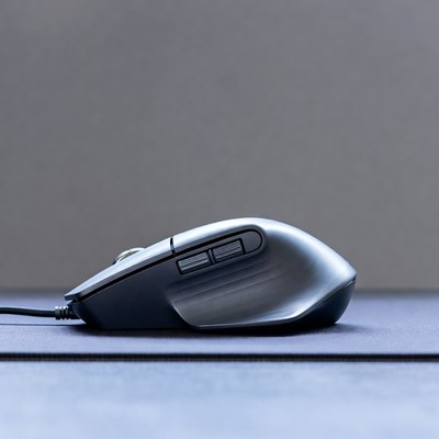 Silver gaming mouse on mat