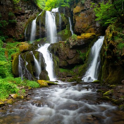 Majestic Multi-Tiered Waterfall in Forest
