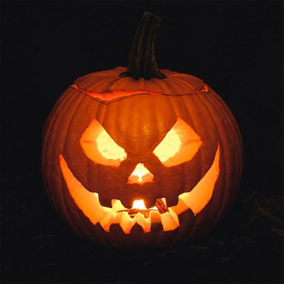 Jack-o'-lantern pumpkin with glowing face