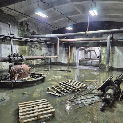 Abandoned Industrial Room Flooded with Water