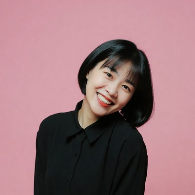 Asian woman smiling on pink background