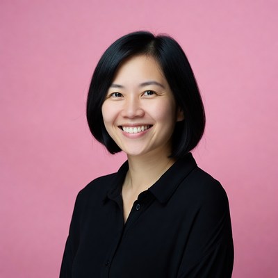 Smiling Asian woman in black shirt