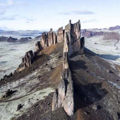 Jagged Rock Formation in Desert Landscape