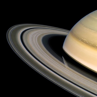 Saturn with rings against space