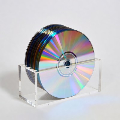 Stack of colorful CDs on clear stand