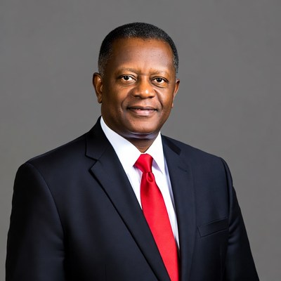 African-American man in navy suit red tie