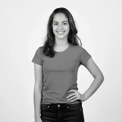 Smiling teenage girl hand on hip