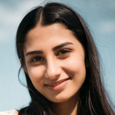 Smiling young woman with dark hair
