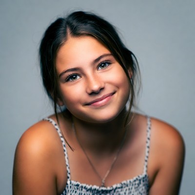 Smiling young woman with green eyes