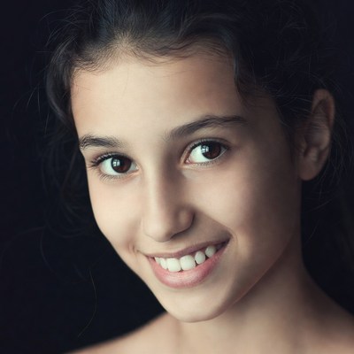 Smiling young girl close-up portrait