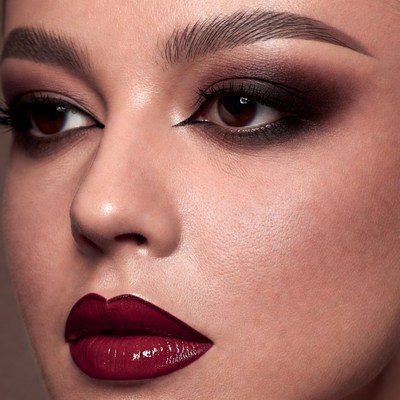Woman with dramatic smokey eye makeup