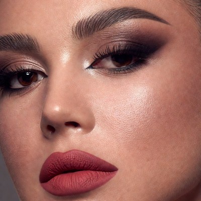 Woman with dramatic smokey eye makeup