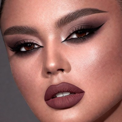 Woman with dramatic smokey eye makeup