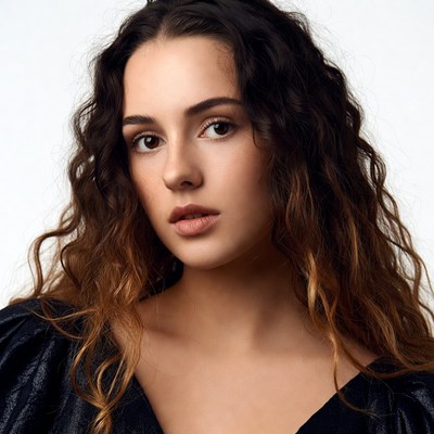 Woman with curly brown hair