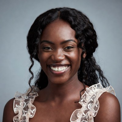 Smiling African-American woman in lace top