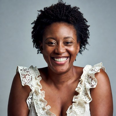 Smiling African-American woman in lace dress
