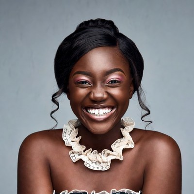 Smiling African-American woman with lace necklace