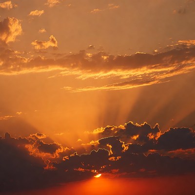 Sunset with Sun Rays Through Clouds