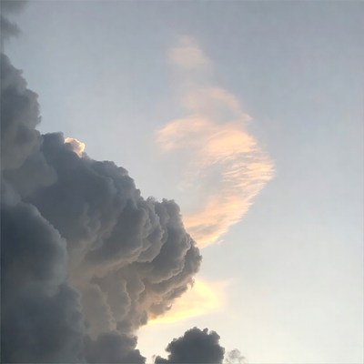 Dramatic Cumulus Clouds at Sunset