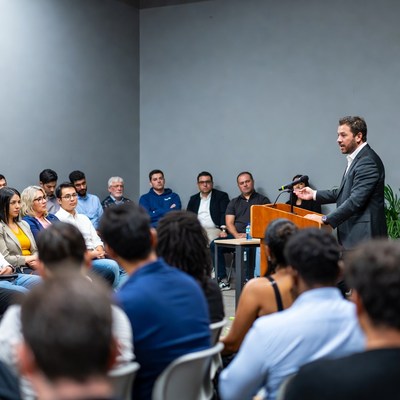 Man speaking at business meeting