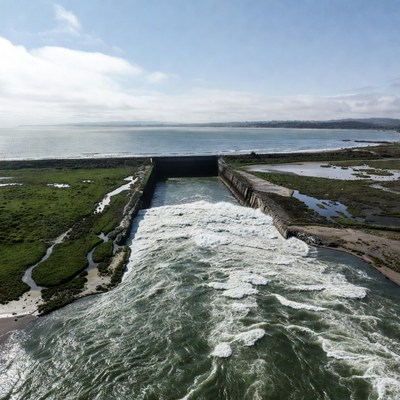 Floodgates Releasing Water into Bay