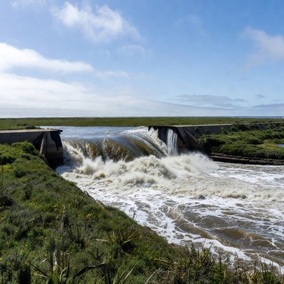 Water cascading over concrete dam