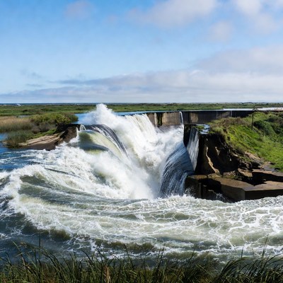 Cascading Waterfall Over Concrete Dam