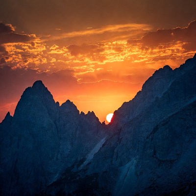 Sunset Between Mountain Peaks