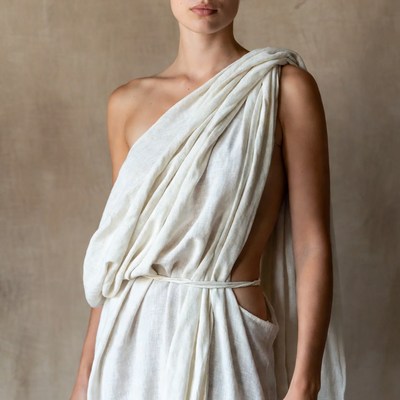 Woman in white draped toga