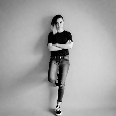 Undercut woman arms crossed standing