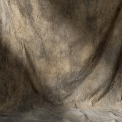 Wrinkled beige fabric backdrop