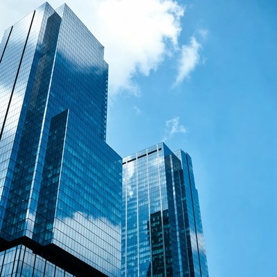 Modern Glass Skyscrapers Blue Sky