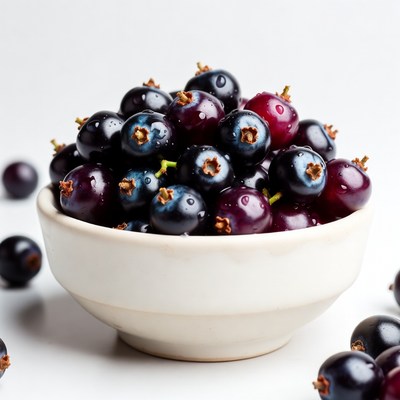 Fresh Black Currants in White Bowl