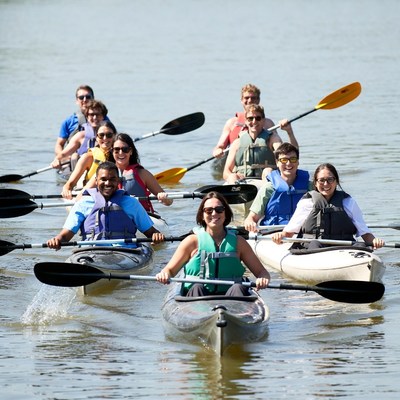Group kayaking on lake