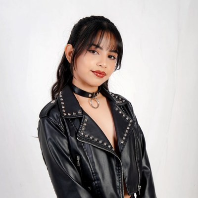 Asian woman in studded leather jacket