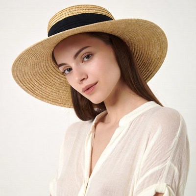 Woman wearing straw hat
