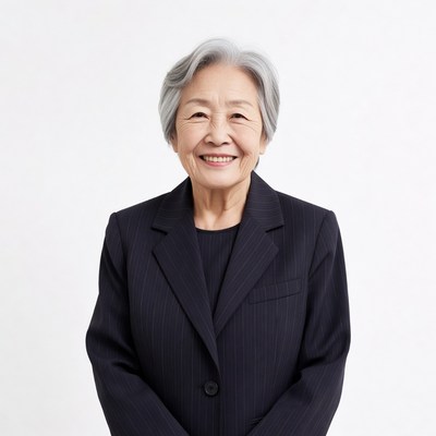 Elderly Asian woman in pinstripe suit