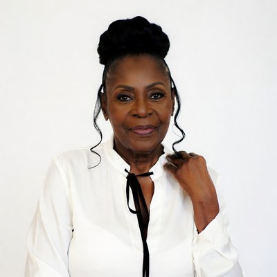 African-American woman in white blouse