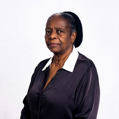 Elderly African-American woman in satin blouse