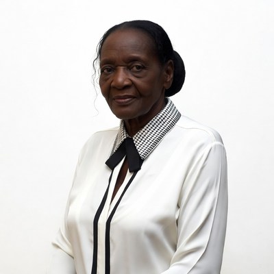 Elderly African-American woman in white blouse