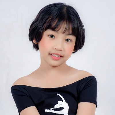Asian girl in black off-shoulder top