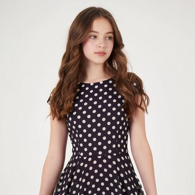 Girl in polka dot dress