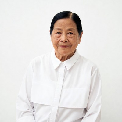 Elderly Asian woman in white shirt