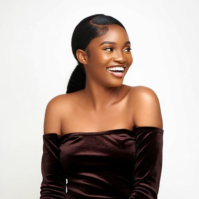 Smiling African-American woman in velvet dress