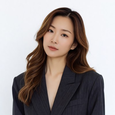 Asian woman in pinstripe suit