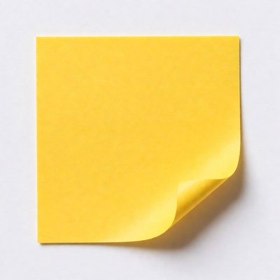 Yellow sticky note peeling corner